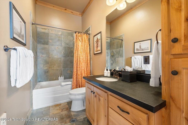 bathroom featuring toilet, ornamental molding, vanity, and shower / bath combo with shower curtain