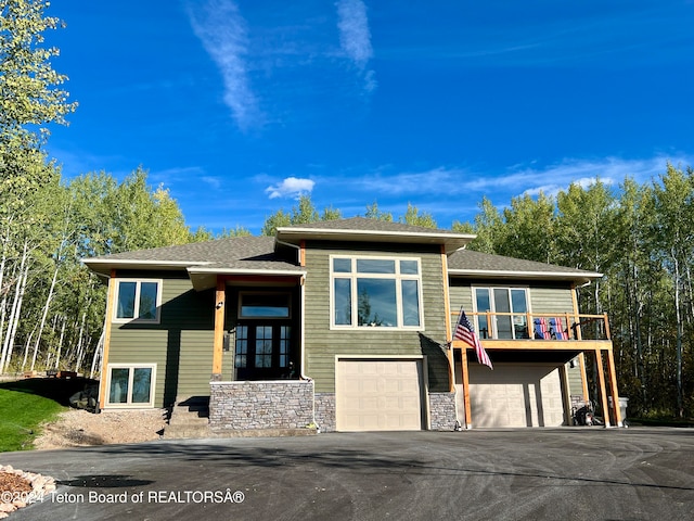 view of front of home with a garage