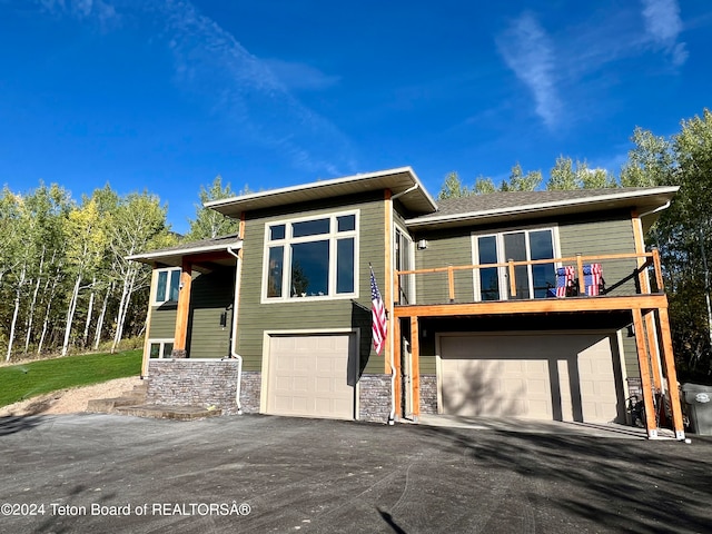 view of front of property with a garage