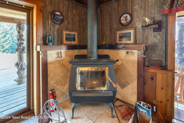 65 Bald Mountain Rd, Dubois, WY 82513 - detailed view of a wood stove and tile walls