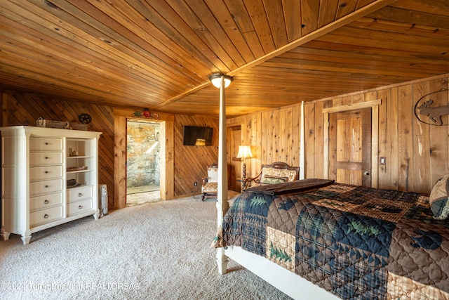 carpeted bedroom with wood walls, vaulted ceiling, and wood ceiling