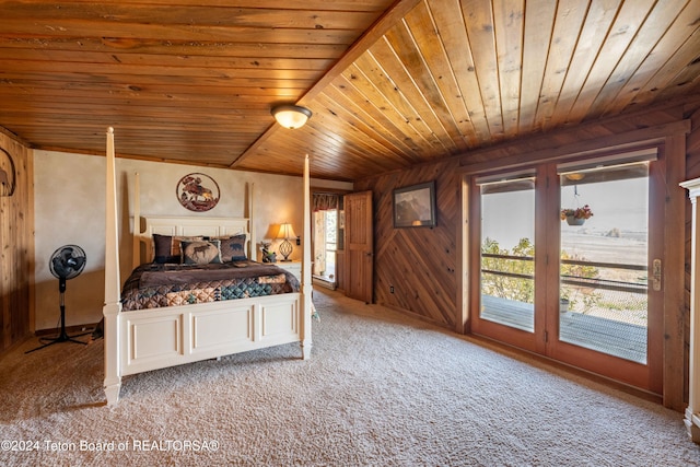 bedroom with light carpet, wood ceiling, wood walls, and lofted ceiling