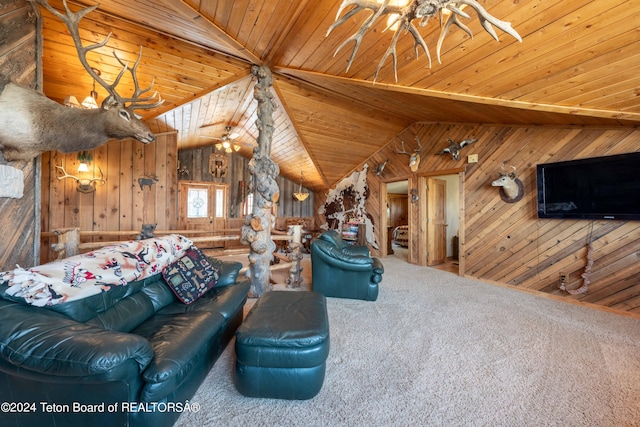 unfurnished living room with wood walls, wooden ceiling, carpet flooring, and ceiling fan