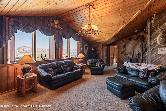 living room featuring wood walls, a chandelier, wooden ceiling, and lofted ceiling