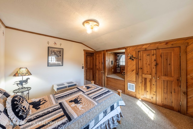 65 Bald Mountain Rd, Dubois, WY 82513 - bedroom featuring carpet, lofted ceiling, and wood walls