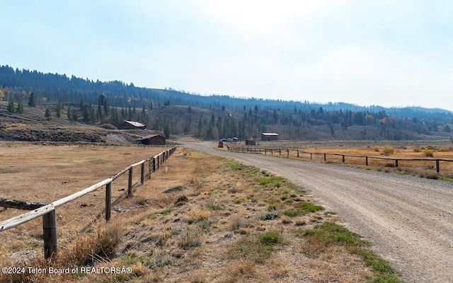 view of road with a rural view