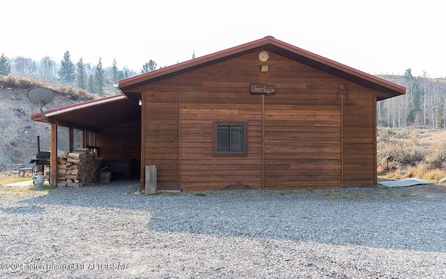 view of outdoor structure featuring a carport