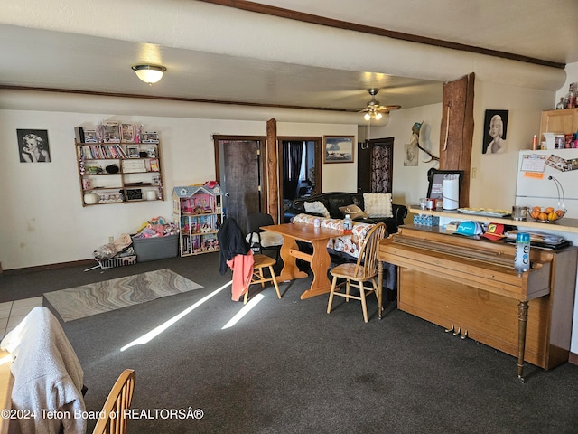 dining area featuring ceiling fan and carpet flooring