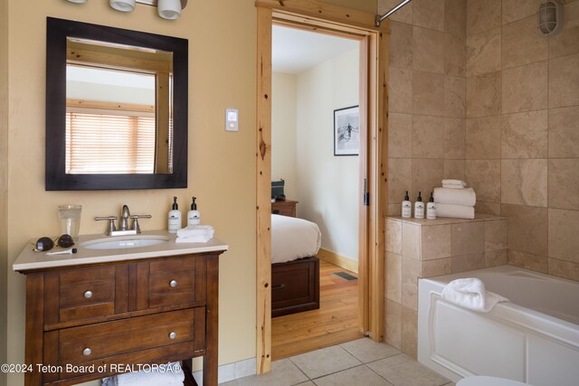 bathroom with vanity and tile patterned flooring