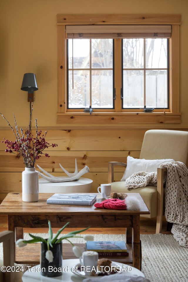 sitting room with wooden walls