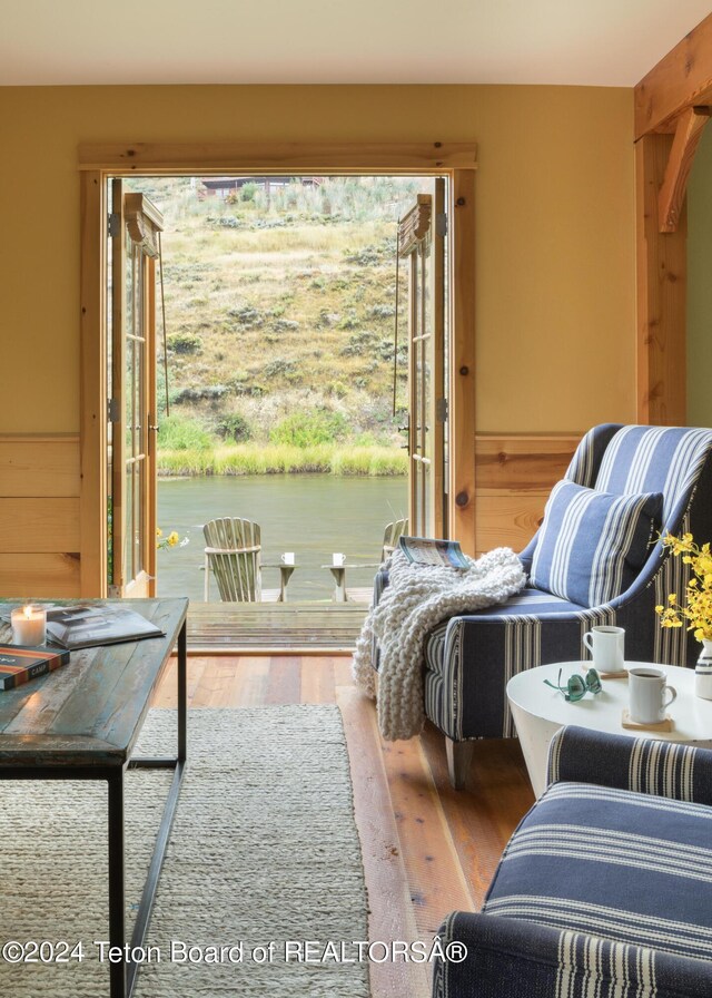 sitting room featuring wood-type flooring