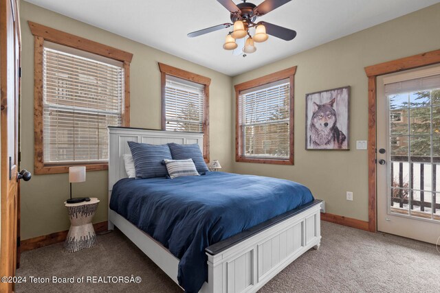 bedroom with ceiling fan and carpet flooring