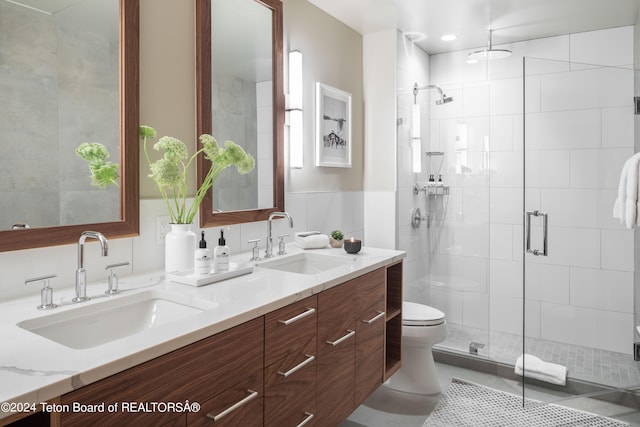 bathroom with vanity, an enclosed shower, toilet, and tile patterned flooring