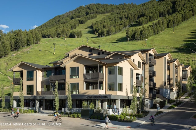 view of building exterior featuring a mountain view