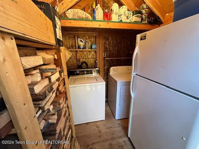 washroom with independent washer and dryer