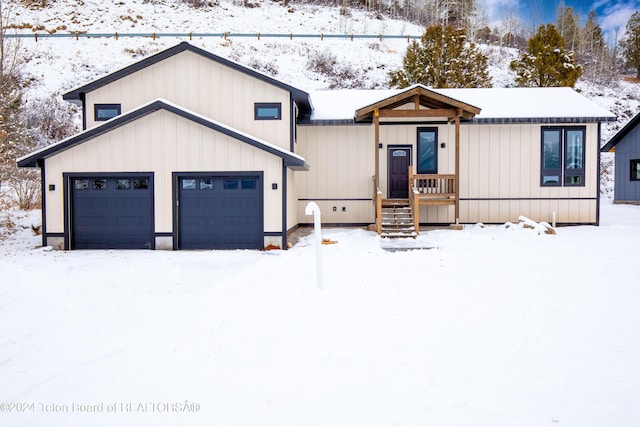 modern farmhouse with a garage