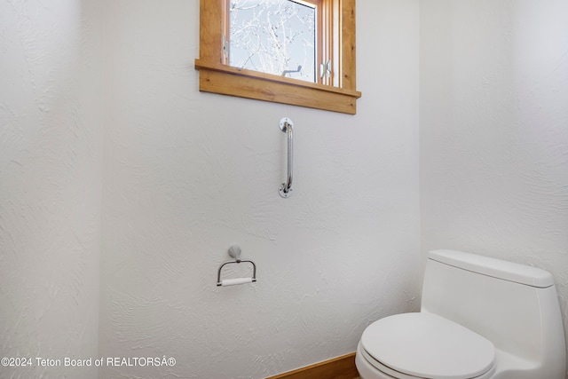 bathroom featuring toilet