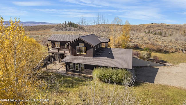 view of front of property with a mountain view