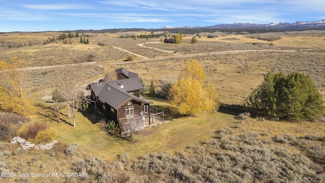 bird's eye view featuring a mountain view and a rural view