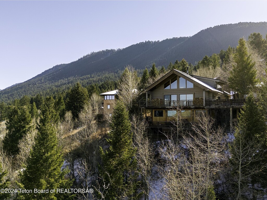 35 Enoch Ferrin Cir, Jackson, WY 83001 - view of mountain background featuring a forest
