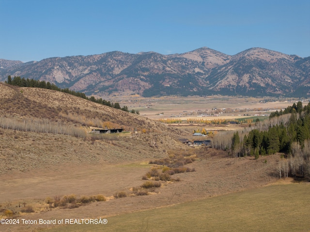 view of mountain feature featuring a rural view