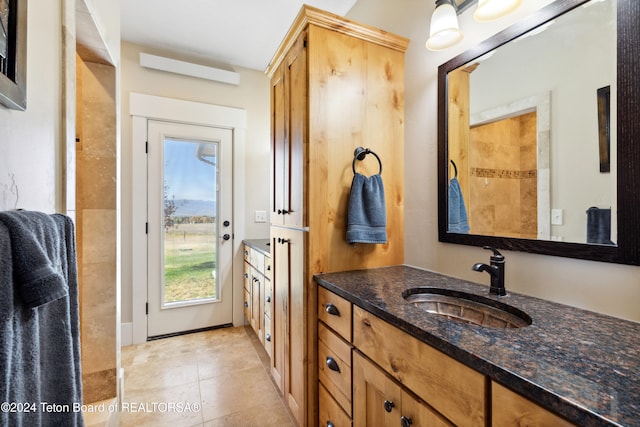 bathroom featuring vanity and tile patterned floors