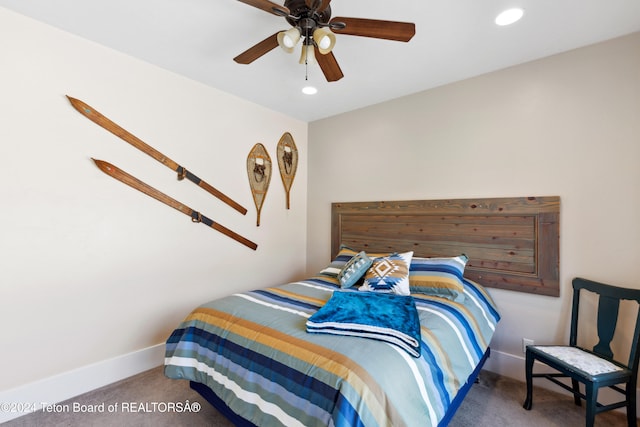 carpeted bedroom with ceiling fan