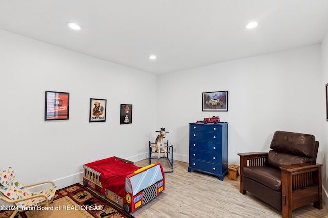 bedroom featuring light wood-type flooring