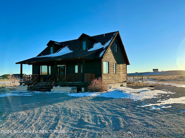 view of front of home featuring covered porch