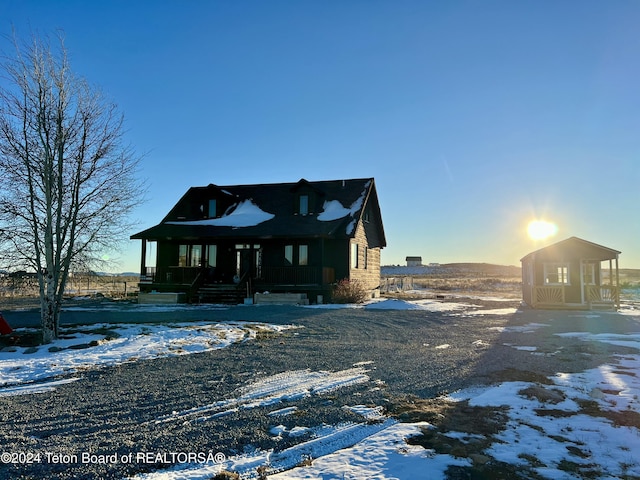 8 S Kicking Bird Rd, Pinedale, WY 82941 - view of front of home with a porch