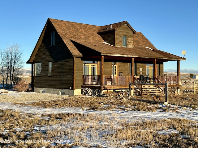 8 S Kicking Bird Rd, Pinedale, WY 82941 - rustic home featuring a porch