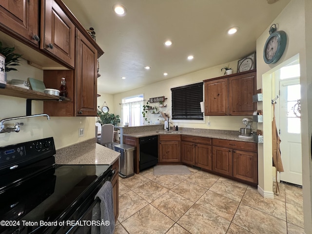 8 S Kicking Bird Rd, Pinedale, WY 82941 - kitchen with black appliances, recessed lighting, light tile patterned floors, open shelves, and light stone countertops
