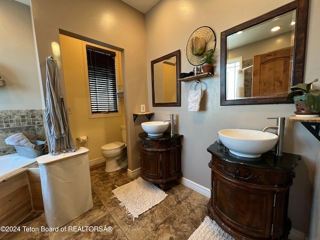 8 S Kicking Bird Rd, Pinedale, WY 82941 - bathroom featuring two vanities and a shower