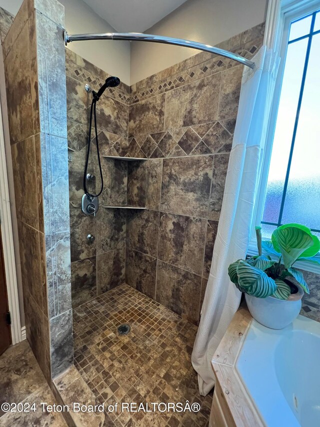 bathroom featuring a shower with curtain