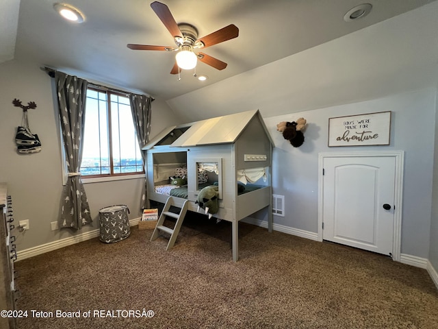 8 S Kicking Bird Rd, Pinedale, WY 82941 - bedroom featuring lofted ceiling and dark carpet