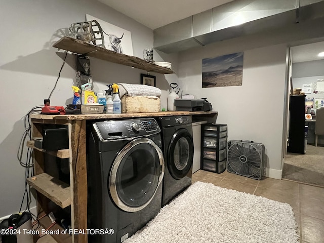8 S Kicking Bird Rd, Pinedale, WY 82941 - laundry area with washing machine and clothes dryer and light tile patterned floors