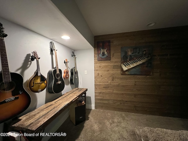 8 S Kicking Bird Rd, Pinedale, WY 82941 - interior space featuring carpet floors, wood walls, lofted ceiling, and recessed lighting