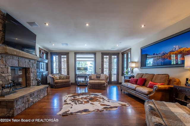 485 N Fall Creek Rd, Wilson, WY 83014 - living area featuring recessed lighting, wood finished floors, a fireplace, and french doors