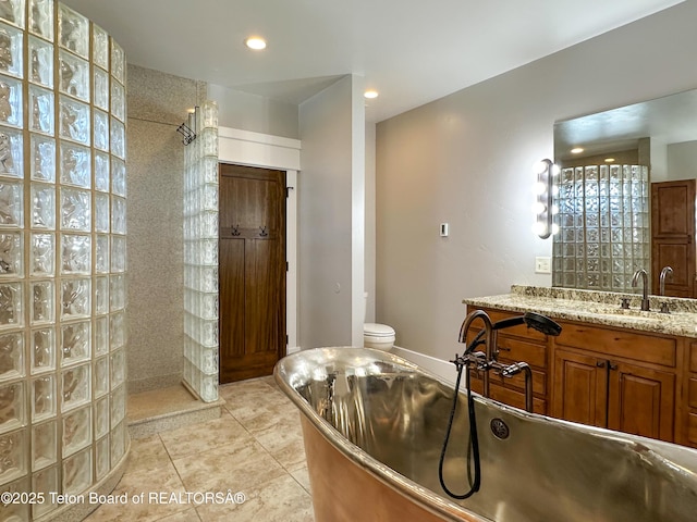 81 Twin Cliffs Rd, Afton, WY 83110 - full bath featuring walk in shower, a freestanding bath, vanity, tile patterned floors, and recessed lighting