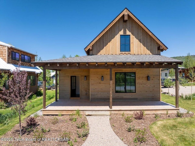 9071 Old Jackson Hwy, Victor, ID 83455 - rear view of house with board and batten siding and a porch