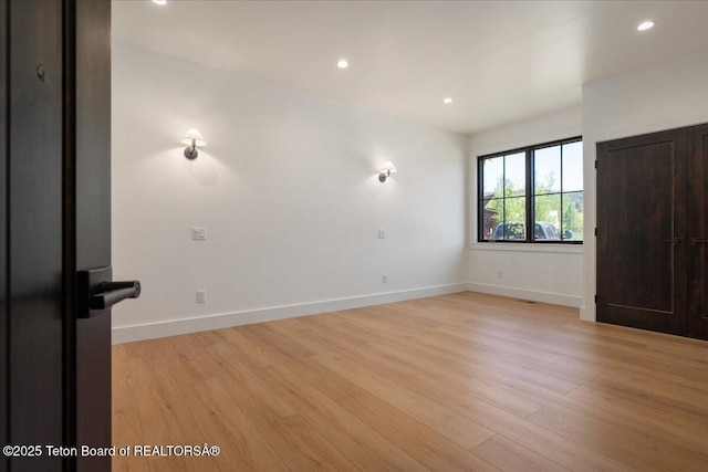9071 Old Jackson Hwy, Victor, ID 83455 - unfurnished room with light wood-type flooring, baseboards, and recessed lighting