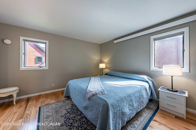 bedroom featuring light wood-type flooring