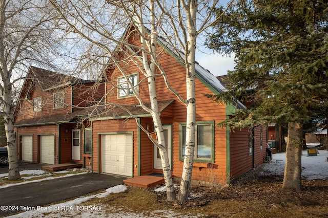 view of front of property with a garage