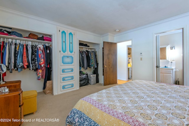 bedroom with light carpet and crown molding