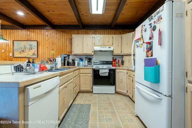 kitchen with beamed ceiling, white appliances, wooden walls, light brown cabinetry, and wood ceiling