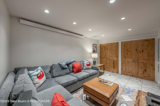 living room with light tile patterned floors