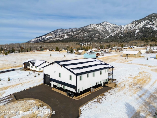 exterior space featuring a mountain view