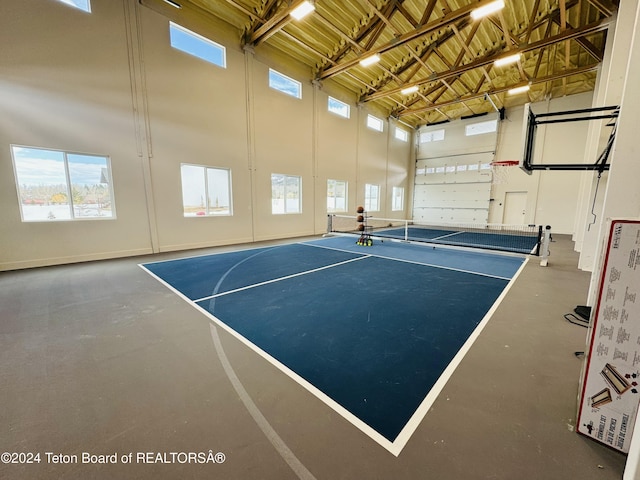 view of sport court with plenty of natural light