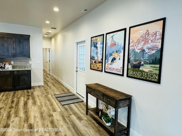 hallway featuring light wood-type flooring