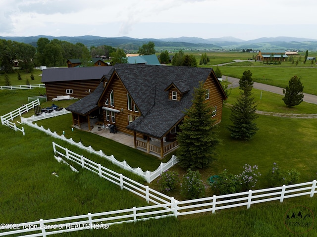 bird's eye view with a mountain view and a rural view